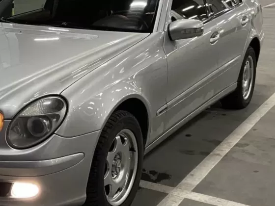 Купить Mercedes-Benz E-class 3200 см3 АКПП (224 л.с.) Дизель турбонаддув в Коржевский: цвет Серебрянный Седан 2004 года по цене 450000 рублей, объявление №25210 на сайте Авторынок23