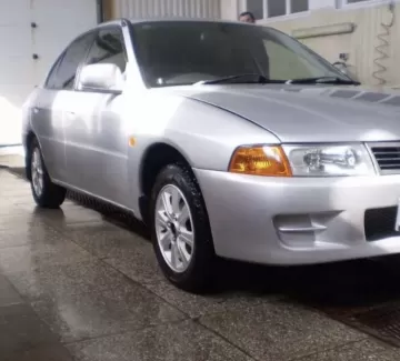 Купить Mitsubishi Lancer 1500 см3 АКПП (110 л.с.) Бензин инжектор в Ильский : цвет Серебряный Седан 1999 года по цене 190000 рублей, объявление №23779 на сайте Авторынок23