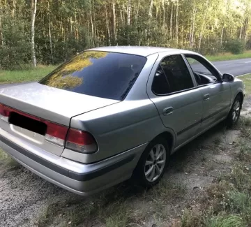 Купить Nissan Sunny 1500 см3 АКПП (105 л.с.) Бензин инжектор в Горное Лоо: цвет Серый Седан 1999 года по цене 280000 рублей, объявление №19699 на сайте Авторынок23