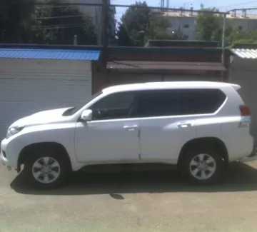 Купить Toyota Land Cruiser Prado 3000 см3 АКПП (173 л.с.) Дизельный в Краснодар: цвет белый Внедорожник 2012 года по цене 1800000 рублей, объявление №4421 на сайте Авторынок23