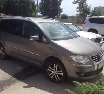Купить Volkswagen Touran 1400 см3 АКПП (170 л.с.) Бензин турбонаддув в Новороссийск: цвет темно-серый Минивэн 2009 года по цене 550000 рублей, объявление №1761 на сайте Авторынок23 Купить Volkswagen Touran 1400 см3 АКПП (170 л.с.) Бензин турбонаддув в Новороссийск: цвет темно-серый Минивэн 2009 года по цене 550000 рублей, объявление №1761 на сайте Авторынок23