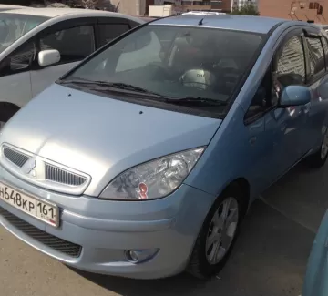 Купить Mitsubishi Colt 1500 см3 АКПП (109 л.с.) Бензин инжектор в Новороссийск: цвет серебристо-голубой Хетчбэк 2003 года по цене 255000 рублей, объявление №1354 на сайте Авторынок23