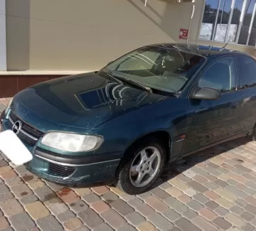 Купить Opel Omega 2000 см3 МКПП (136 л.с.) Бензин инжектор в Ладожская : цвет Зелёный Седан 1995 года по цене 335000 рублей, объявление №22014 на сайте Авторынок23