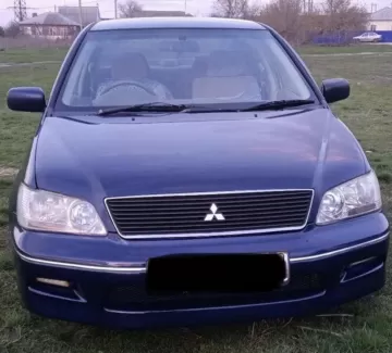 Купить Mitsubishi Lancer 1500 см3 АКПП (100 л.с.) Бензин инжектор в Прикубанский: цвет Синий темный Седан 2001 года по цене 300000 рублей, объявление №26521 на сайте Авторынок23