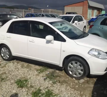 Купить Nissan Tiida Latio 1500 см3 АКПП (109 л.с.) Бензин инжектор в Новороссийск: цвет белый Седан 2005 года по цене 310000 рублей, объявление №1543 на сайте Авторынок23