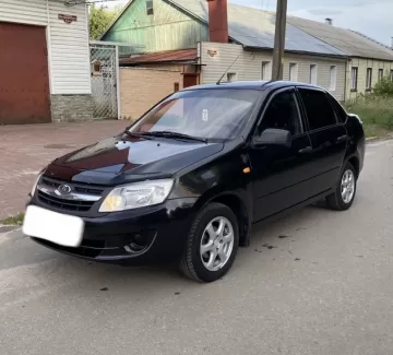 Купить ВАЗ (LADA) Granta 1600 см3 МКПП (87 л.с.) Бензин инжектор в Славянск на Кубани : цвет Черный Седан 2012 года по цене 170000 рублей, объявление №21949 на сайте Авторынок23