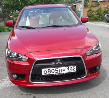 Купить Mitsubishi Lancer 10 1600 см3 МКПП (117 л.с.) Бензиновый в Краснодар: цвет красный металик Седан 2013 года по цене 710000 рублей, объявление №8812 на сайте Авторынок23