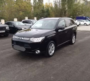 Купить Mitsubishi Outlander 2000 см3 АКПП (146 л.с.) Бензин инжектор в Новороссийск: цвет черный Кроссовер 2012 года по цене 1050000 рублей, объявление №2332 на сайте Авторынок23