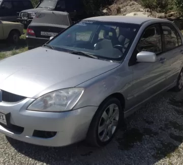 Купить Mitsubishi Lancer 1600 см3 АКПП (99 л.с.) Бензин инжектор в Новороссийск: цвет серебро Седан 2004 года по цене 310000 рублей, объявление №2165 на сайте Авторынок23 Купить Mitsubishi Lancer 1600 см3 АКПП (99 л.с.) Бензин инжектор в Новороссийск: цвет серебро Седан 2004 года по цене 310000 рублей, объявление №2165 на сайте Авторынок23