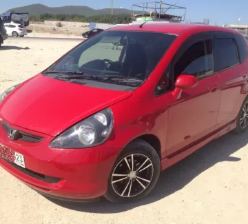 Купить Honda Fit 1300 см3 АКПП (86 л.с.) Бензин инжектор в Новороссийск: цвет красный Хетчбэк 2002 года по цене 210000 рублей, объявление №1994 на сайте Авторынок23