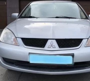 Купить Mitsubishi Lancer 1600 см3 АКПП (98 л.с.) Бензин карбюратор в Темрюк: цвет Серебристый Седан 2007 года по цене 500000 рублей, объявление №22067 на сайте Авторынок23