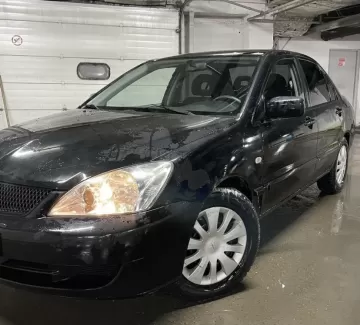 Купить Mitsubishi Lancer 1600 см3 МКПП (98 л.с.) Бензин инжектор в Ладожская : цвет Черный Седан 2007 года по цене 505000 рублей, объявление №23792 на сайте Авторынок23
