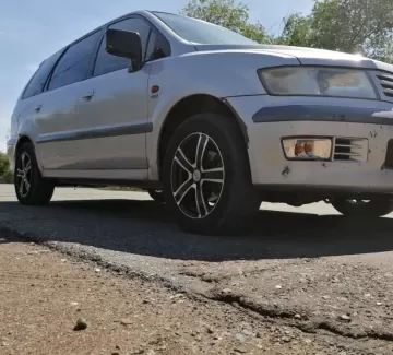 Купить Mitsubishi Chariot Grandis 2400 см3 АКПП (165 л.с.) Бензин инжектор в Советский : цвет Серый Минивэн 1998 года по цене 535000 рублей, объявление №22479 на сайте Авторынок23