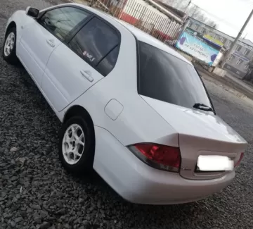 Купить Mitsubishi Lancer 1500 см3 АКПП (114 л.с.) Бензин инжектор в Рисовый: цвет Серебристый Седан 2003 года по цене 255000 рублей, объявление №25028 на сайте Авторынок23 Купить Mitsubishi Lancer 1500 см3 АКПП (114 л.с.) Бензин инжектор в Рисовый: цвет Серебристый Седан 2003 года по цене 255000 рублей, объявление №25028 на сайте Авторынок23