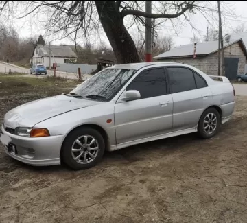 Купить Mitsubishi Lancer 1500 см3 АКПП (110 л.с.) Бензин инжектор в Прикубансккий: цвет Серебристый Седан 1999 года по цене 320000 рублей, объявление №25235 на сайте Авторынок23