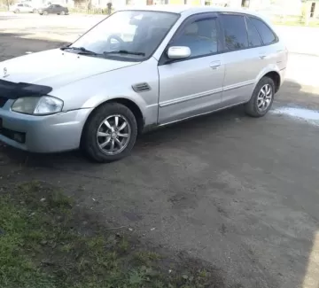 Купить Mazda Familia 1500 см3 АКПП (110 л.с.) Бензин инжектор в Апшеронск: цвет Серебристый Универсал 2000 года по цене 220000 рублей, объявление №20072 на сайте Авторынок23