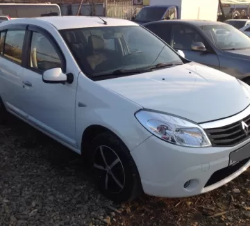 Купить Renault Sandero 1600 см3 АКПП (102 л.с.) Бензин инжектор в п.Яблоновский: цвет белый Хетчбэк 2011 года по цене 415000 рублей, объявление №2674 на сайте Авторынок23