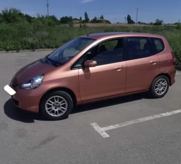 Купить Honda Jazz 1300 см3 АКПП (86 л.с.) Бензин инжектор в Тамань: цвет Оранжевый Хетчбэк 2004 года по цене 365000 рублей, объявление №21755 на сайте Авторынок23