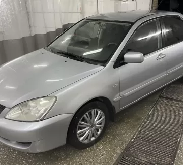Купить Mitsubishi Lancer 1600 см3 МКПП (98 л.с.) Бензин инжектор в Старомышастовская: цвет Серебряный Седан 2007 года по цене 505000 рублей, объявление №23782 на сайте Авторынок23