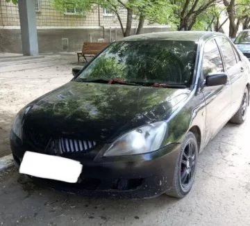 Купить Mitsubishi Lancer 1500 см3 АКПП (100 л.с.) Бензин инжектор в Трудобеликовский: цвет Черный Седан 2001 года по цене 260000 рублей, объявление №21783 на сайте Авторынок23