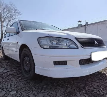 Купить Mitsubishi Lancer 1600 см3 АКПП (100 л.с.) Бензин инжектор в Новотитаровская: цвет Белый Седан 2001 года по цене 444000 рублей, объявление №26495 на сайте Авторынок23