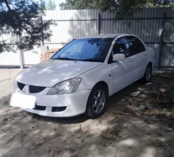 Купить Mitsubishi Lancer 1500 см3 АКПП (100 л.с.) Бензин инжектор в Петровская: цвет Белый Седан 2001 года по цене 265000 рублей, объявление №21761 на сайте Авторынок23 Купить Mitsubishi Lancer 1500 см3 АКПП (100 л.с.) Бензин инжектор в Петровская: цвет Белый Седан 2001 года по цене 265000 рублей, объявление №21761 на сайте Авторынок23