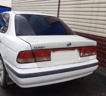 Купить Nissan Sunny 1495 см3 АКПП (105 л.с.) Бензин инжектор в Тамань: цвет Белый Седан 1998 года по цене 170000 рублей, объявление №24798 на сайте Авторынок23