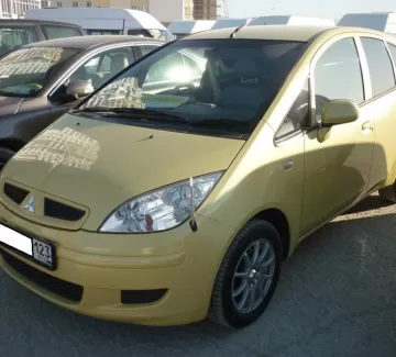 Купить Mitsubishi Colt 1300 см3 АКПП (90 л.с.) Бензиновый в Новороссийск: цвет желтый перламутр Хетчбэк 2004 года по цене 275000 рублей, объявление №676 на сайте Авторынок23