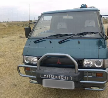 Купить Mitsubishi Delica 2800 см3 АКПП (140 л.с.) Дизельный в Кучугуры: цвет Зелёный Минивэн 1992 года по цене 320000 рублей, объявление №21045 на сайте Авторынок23