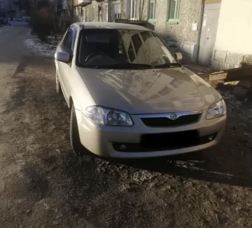 Купить Mazda Familia 1400 см3 АКПП (85 л.с.) Бензин инжектор в Усть-Лабинск : цвет Бежевый Седан 1999 года по цене 220000 рублей, объявление №20984 на сайте Авторынок23