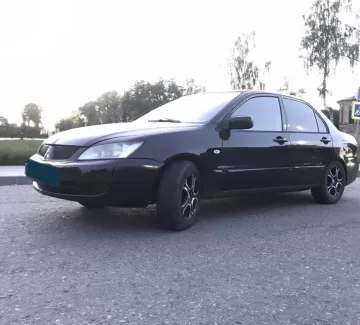 Купить Mitsubishi Lancer 1500 см3 CVT (115 л.с.) Бензин инжектор в Апшеронск: цвет Черный Седан 2003 года по цене 240000 рублей, объявление №25059 на сайте Авторынок23 Купить Mitsubishi Lancer 1500 см3 CVT (115 л.с.) Бензин инжектор в Апшеронск: цвет Черный Седан 2003 года по цене 240000 рублей, объявление №25059 на сайте Авторынок23