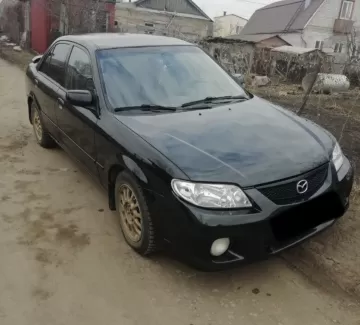 Купить Mazda Protege 2000 см3 АКПП (131 л.с.) Бензин инжектор в Небуг: цвет Чёрный Седан 2001 года по цене 180000 рублей, объявление №21162 на сайте Авторынок23