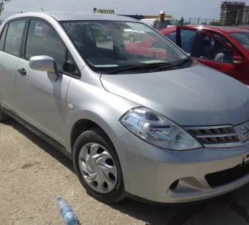 Купить Nissan Tiida Latio 1500 см3 АКПП (109 л.с.) Бензин инжектор в Новороссийск: цвет серебро Седан 2009 года по цене 390000 рублей, объявление №1398 на сайте Авторынок23