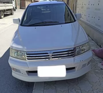 Купить Mitsubishi Chariot Grand 2400 см3 АКПП (168 л.с.) Бензин инжектор в Новокубанск : цвет Белый Минивэн 1999 года по цене 530000 рублей, объявление №23971 на сайте Авторынок23