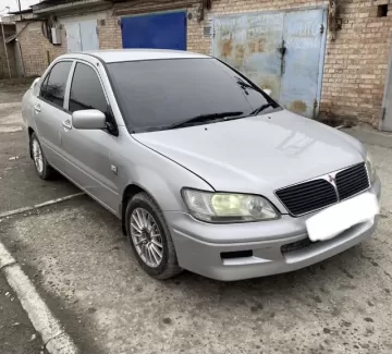 Купить Mitsubishi Lancer Cedia 1800 см3 АКПП (130 л.с.) Бензин инжектор в Брюховецкая: цвет Серебряный Седан 2002 года по цене 350000 рублей, объявление №21302 на сайте Авторынок23