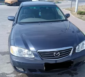 Купить Mazda Millenia '2000 АКПП (2000/160 л.с.) Бензин инжектор Мирный цвет Черный Седан по цене 510000 рублей, объявление №27433 на сайте Авторынок23