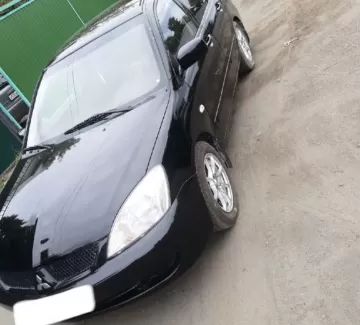 Купить Mitsubishi Lancer 1600 см3 МКПП (98 л.с.) Бензин инжектор в Варениковская: цвет Черный Седан 2005 года по цене 350000 рублей, объявление №22470 на сайте Авторынок23