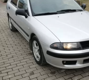 Купить Mitsubishi Carisma 1600 см3 МКПП (103 л.с.) Бензин инжектор в Кропоткин : цвет Серебряный Седан 2003 года по цене 185000 рублей, объявление №23195 на сайте Авторынок23