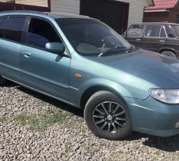 Купить Mazda Familia 1500 см3 АКПП (110 л.с.) Бензин инжектор в Тихорецк : цвет Зелёный Универсал 2003 года по цене 220000 рублей, объявление №20063 на сайте Авторынок23