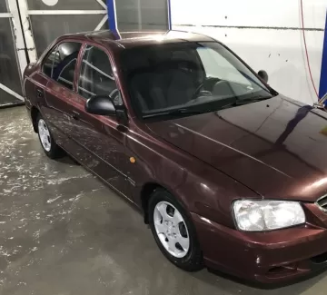 Купить Hyundai Accent 1500 см3 АКПП (90 л.с.) Бензин инжектор в Тамань : цвет Красный Седан 2006 года по цене 150000 рублей, объявление №24419 на сайте Авторынок23