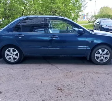Купить Mitsubishi Lancer 1500 см3 CVT (114 л.с.) Бензин инжектор в Краснодар: цвет Синий Седан 2003 года по цене 255000 рублей, объявление №25050 на сайте Авторынок23