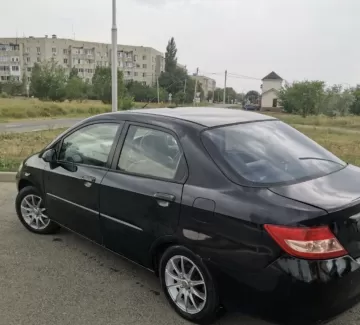 Купить Honda City 1500 см3 CVT (110 л.с.) Бензин инжектор в Ольгинка : цвет Чёрный Хетчбэк 2004 года по цене 180000 рублей, объявление №20085 на сайте Авторынок23