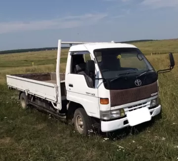 Купить Toyota Toyo Ace 4600 см3 МКПП (130 л.с.) Дизельный в Попутная: цвет Белый Бортовой 2001 года по цене 185000 рублей, объявление №22712 на сайте Авторынок23