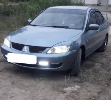 Купить Mitsubishi Lancer 1600 см3 МКПП (98 л.с.) Бензин инжектор в Новоминская: цвет Зелёный Седан 2005 года по цене 380000 рублей, объявление №22490 на сайте Авторынок23