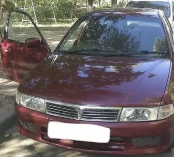 Купить Mitsubishi Lancer 1500 см3 АКПП (110 л.с.) Бензин инжектор в Голубицкая : цвет Красный Седан 1999 года по цене 195000 рублей, объявление №23719 на сайте Авторынок23