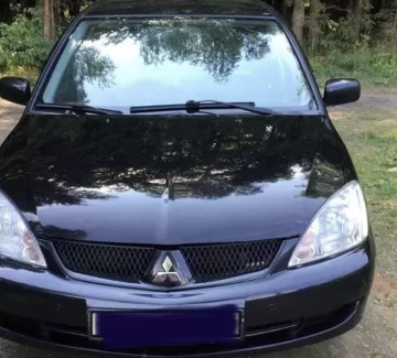 Купить Mitsubishi Lancer 1600 см3 АКПП (98 л.с.) Бензин карбюратор в Анапа: цвет Черный Седан 2007 года по цене 500000 рублей, объявление №22083 на сайте Авторынок23