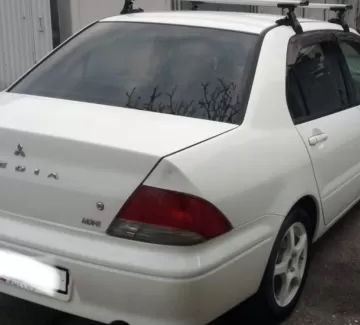 Купить Mitsubishi Lancer cedia 1600 см3 АКПП (130 л.с.) Бензин инжектор в Краснодар: цвет Белый Седан 2002 года по цене 355000 рублей, объявление №22393 на сайте Авторынок23