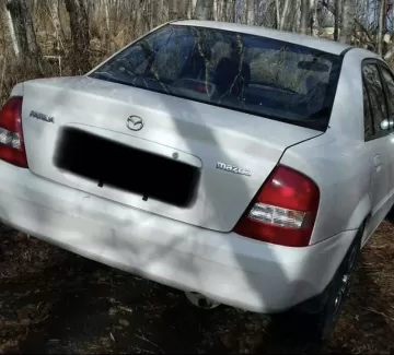 Купить Mazda Familia 1400 см3 АКПП (85 л.с.) Бензин инжектор в Анапская : цвет Белый Седан 1999 года по цене 225000 рублей, объявление №20932 на сайте Авторынок23