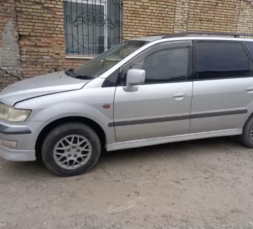 Купить Mitsubishi Chariot Grand 2400 см3 АКПП (168 л.с.) Бензин инжектор в Анапа : цвет Серебряный Минивэн 1999 года по цене 520000 рублей, объявление №23959 на сайте Авторынок23