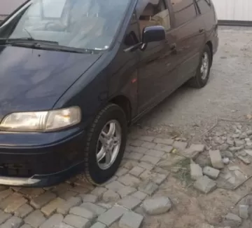 Купить Honda Odyssey 2300 см3 АКПП (150 л.с.) Бензин инжектор в Ивановская: цвет Синий Минивэн 1998 года по цене 224000 рублей, объявление №21265 на сайте Авторынок23